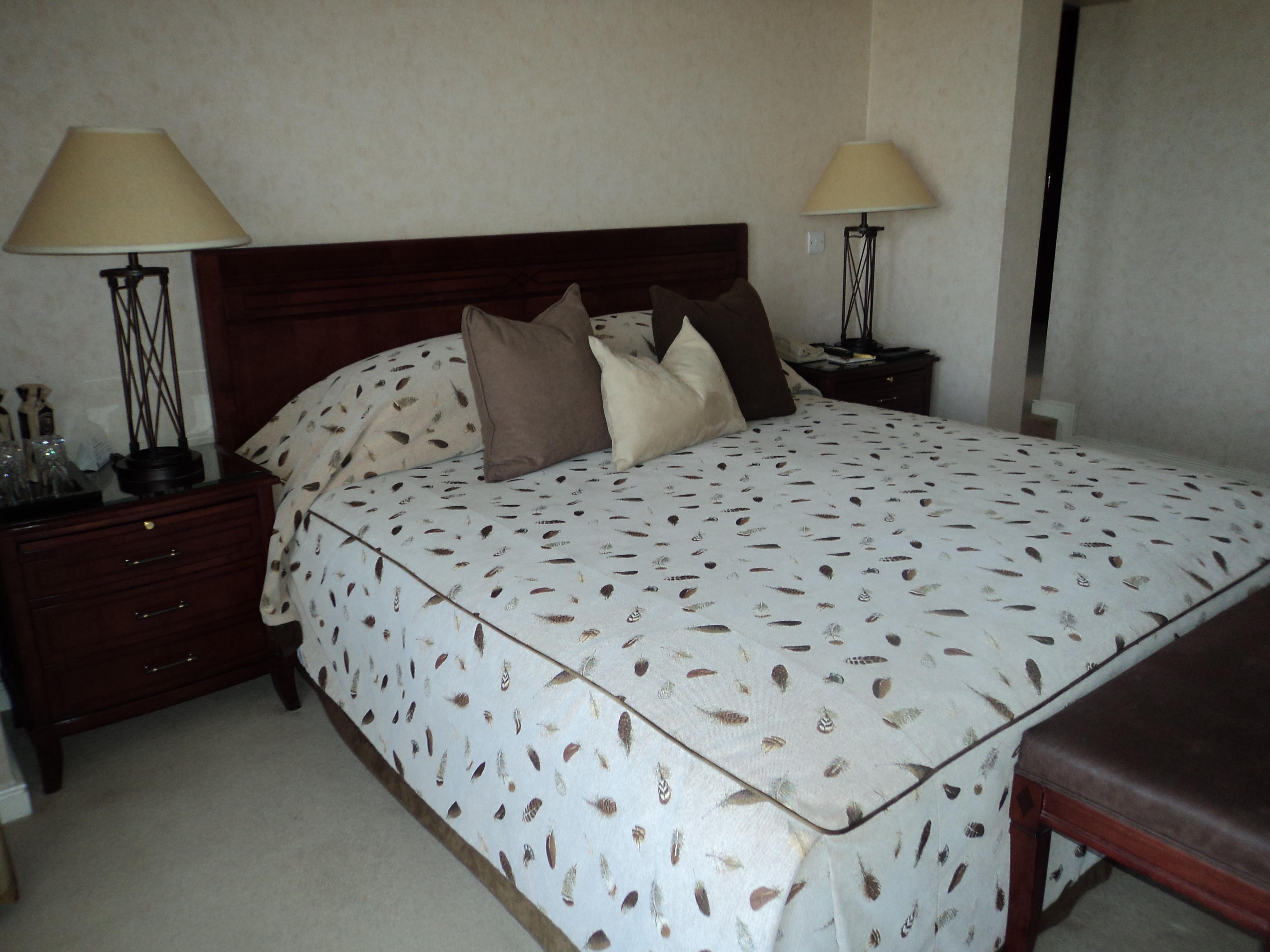 Taj Pamodzi Lusaka Exterior photo A bed with a duvet
