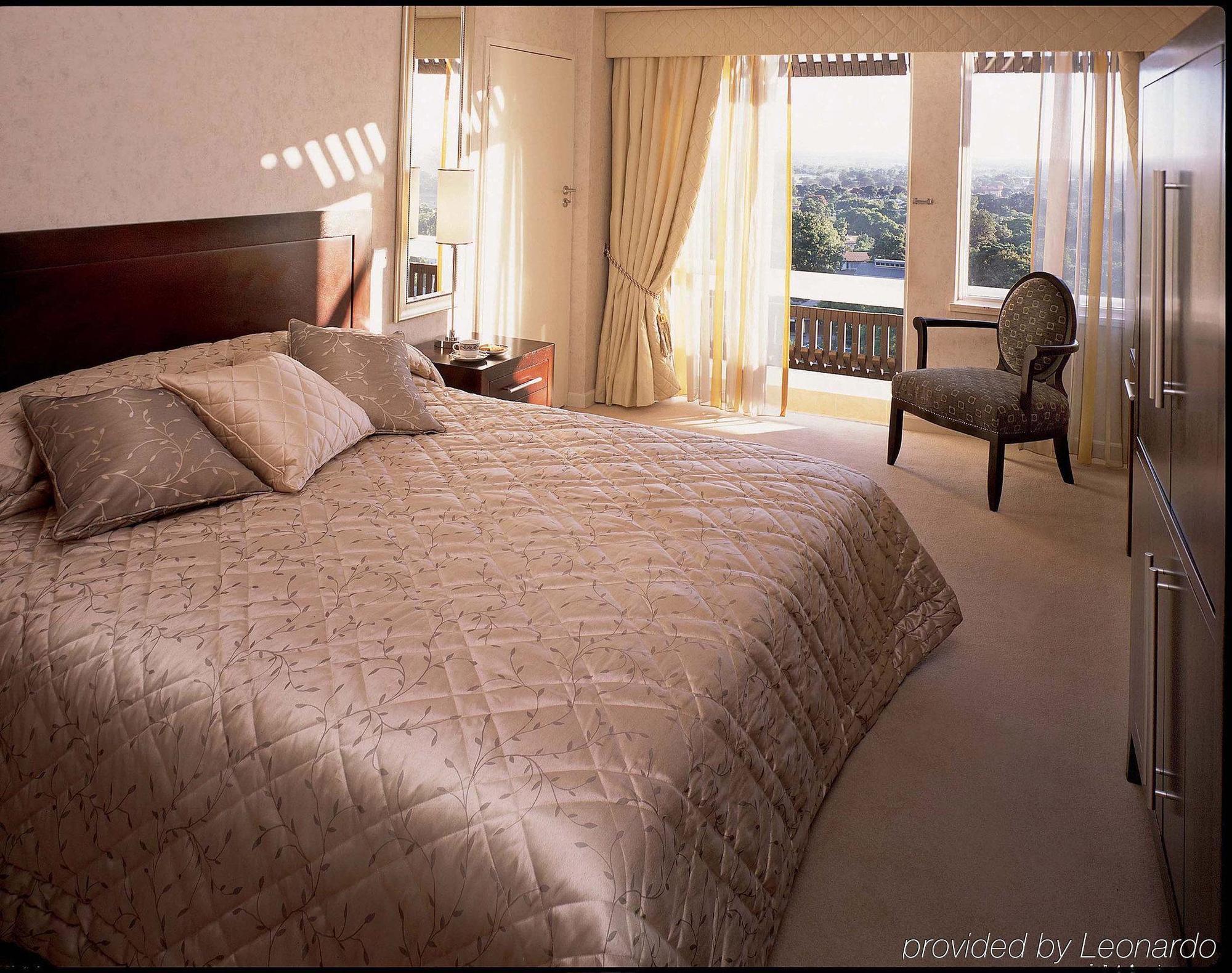 Taj Pamodzi Lusaka Room photo A bedroom at the Mandarin Oriental, Hong Kong