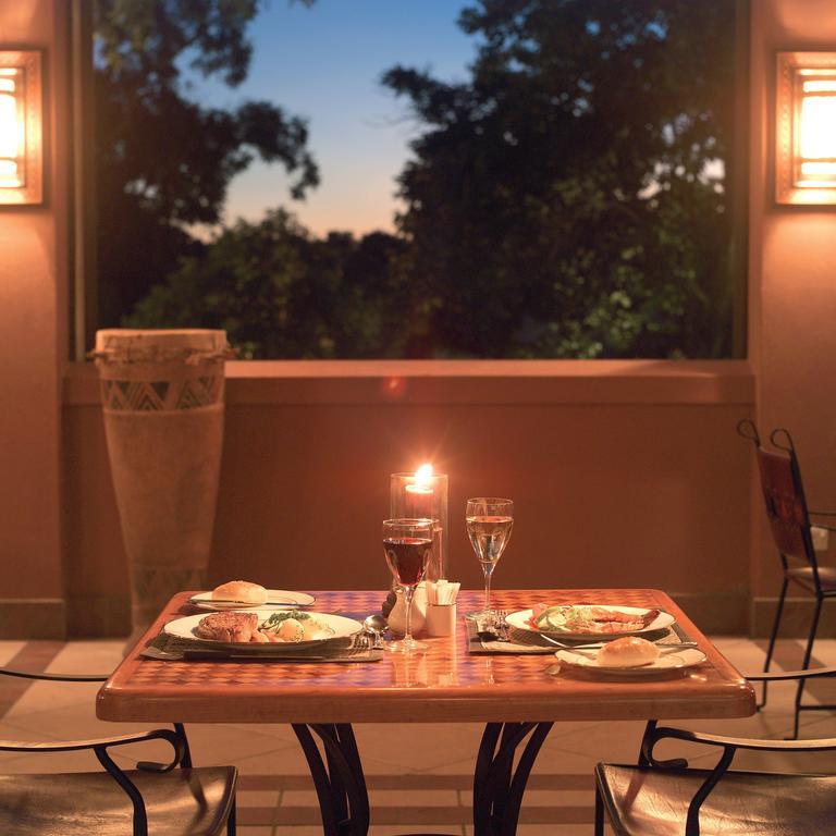Taj Pamodzi Lusaka Exterior photo A table set for dinner