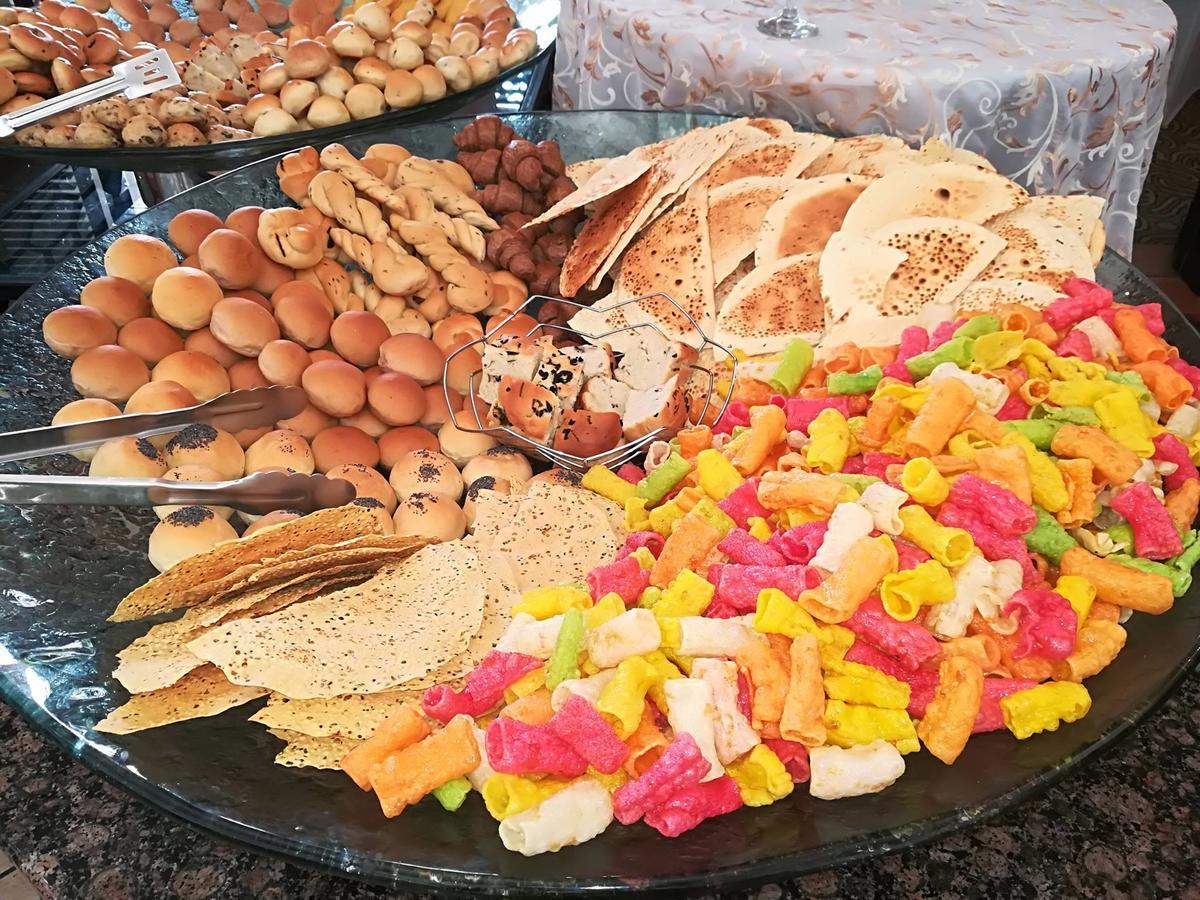 Taj Pamodzi Lusaka Exterior photo A selection of Indian snacks
