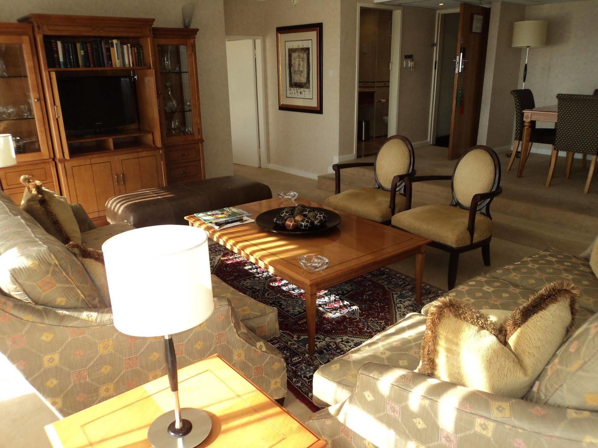 Taj Pamodzi Lusaka Exterior photo A living room in a typical apartment