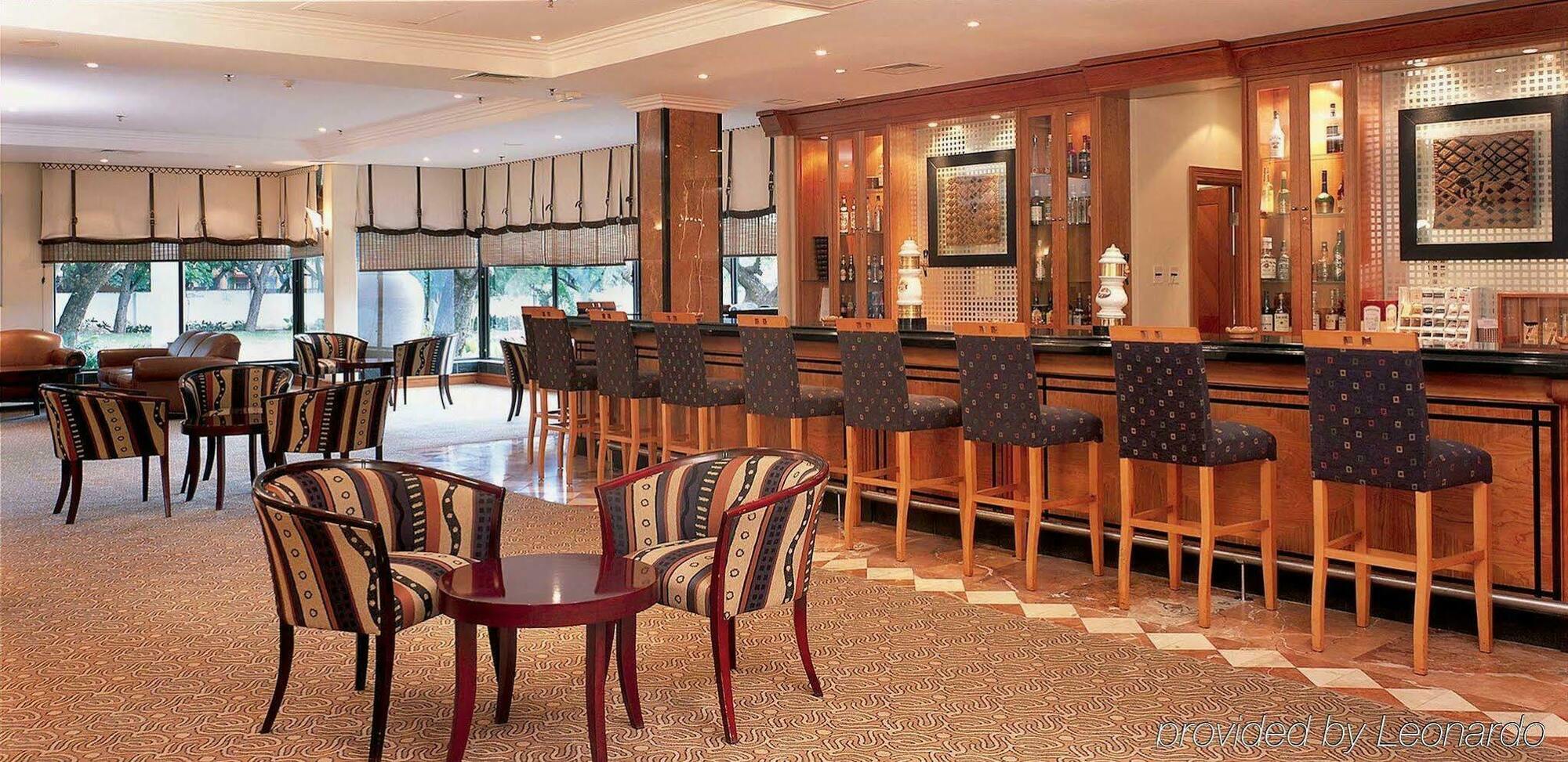 Taj Pamodzi Lusaka Restaurant photo The bar at the hotel